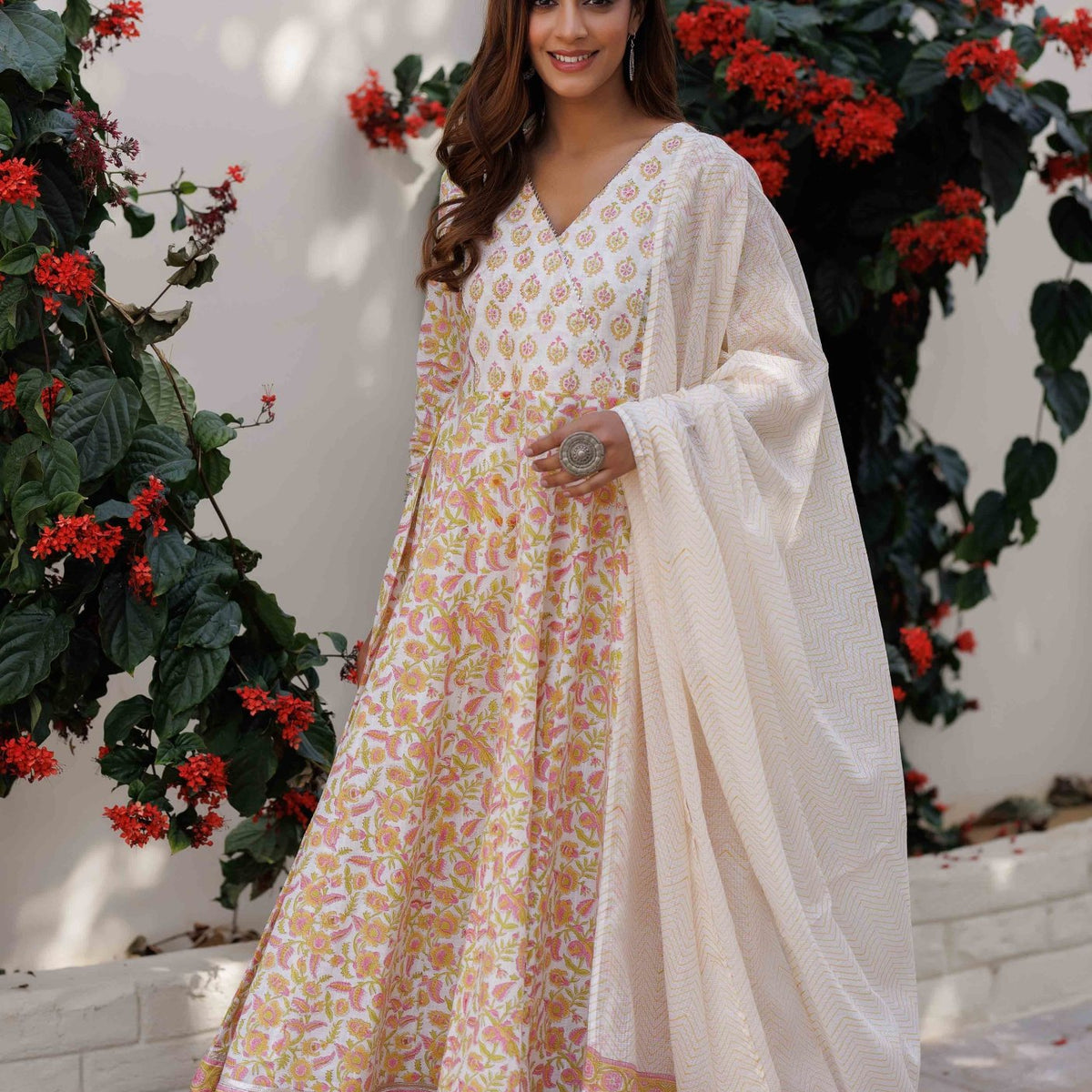 White anarkali with yellow store dupatta
